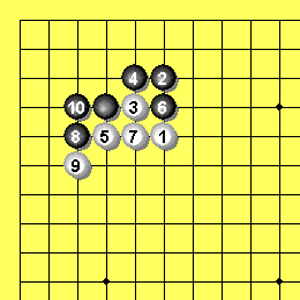 Fig.2c.gif: Joseki-Fortsetzung zur Ecke L von Weiß